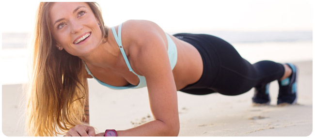 Woman Doing Push-up and Smiling.