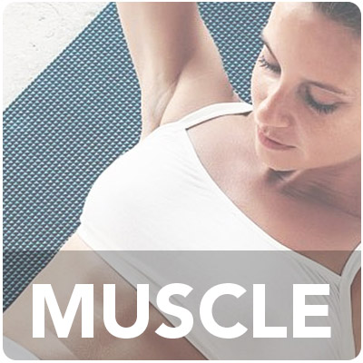 Muscular woman doing sit-ups