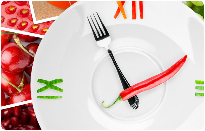 Plate with food made out to look like a clock